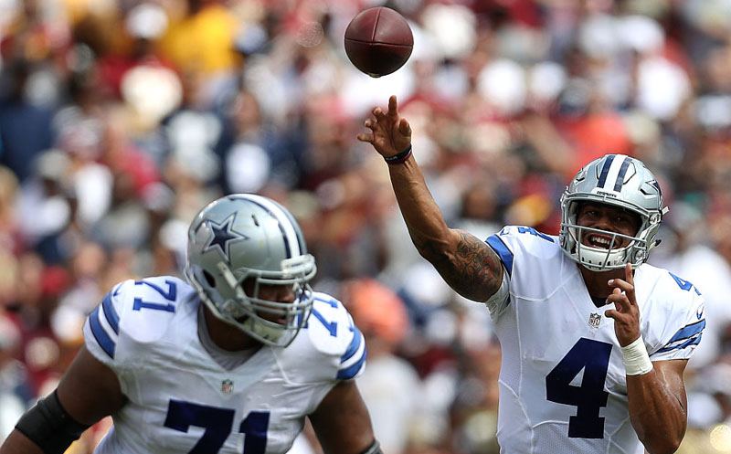LANDOVER, MD - SEPTEMBER 18: Quarterback Dak Prescott #4 of the Dallas Cowboys passes while teammate offensive guard La'el Collins #71 blocks against the Washington Redskins in the first quarter at FedExField on September 18, 2016 in Landover, Maryland. (Photo by Patrick Smith/Getty Images)