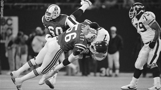 New England Patriots linebacker Andre Tippett sacks quarterback