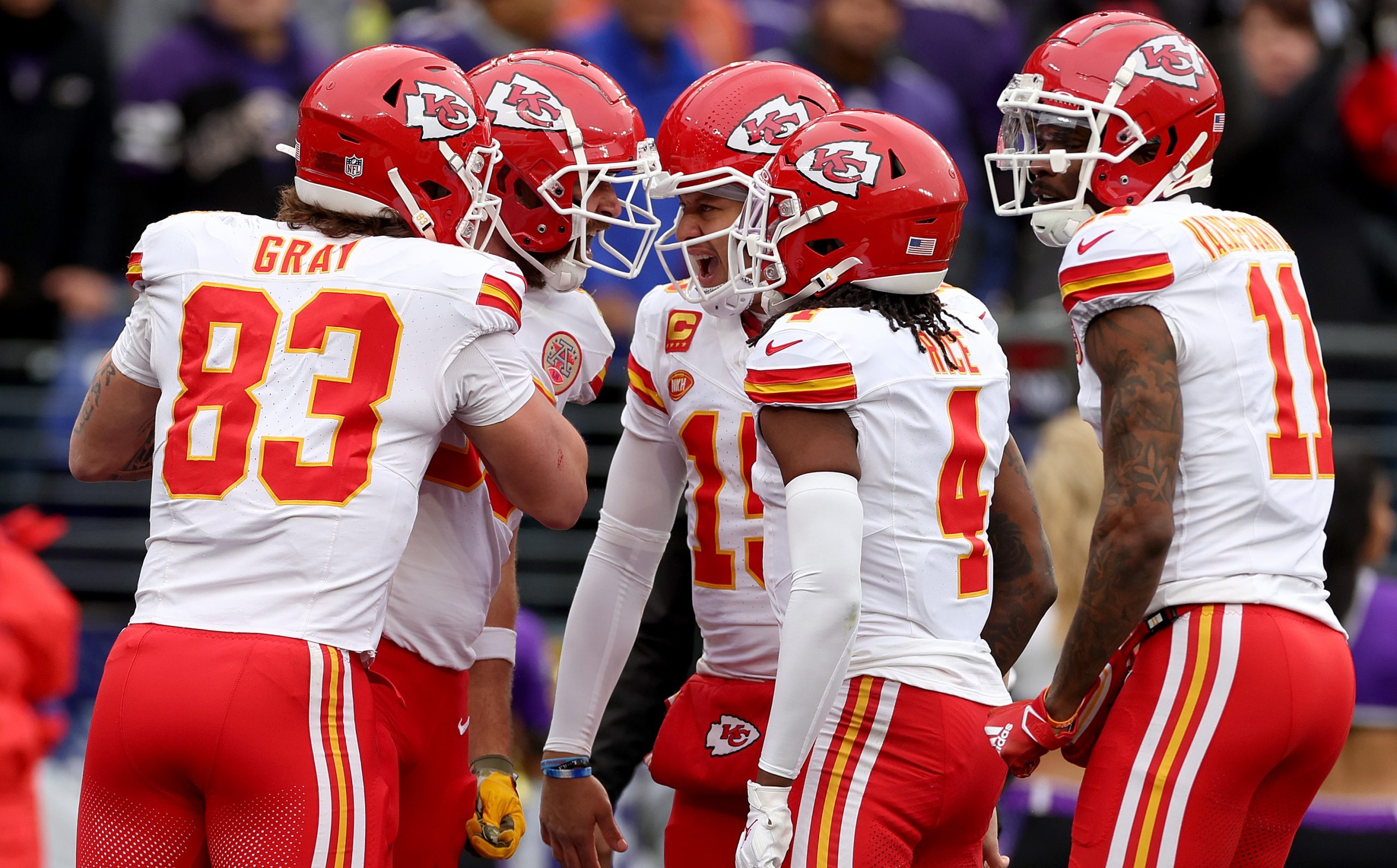 BALTIMORE, MARYLAND - JANUARY 28: Travis Kelce #87 of the Kansas City Chiefs celebrates with Patrick Mahomes #15 and teammates after a touchdown pass against the Baltimore Ravens during the first quarter in the AFC Championship Game at M&T Bank Stadium on January 28, 2024 in Baltimore, Maryland. (Photo by Rob Carr/Getty Images)