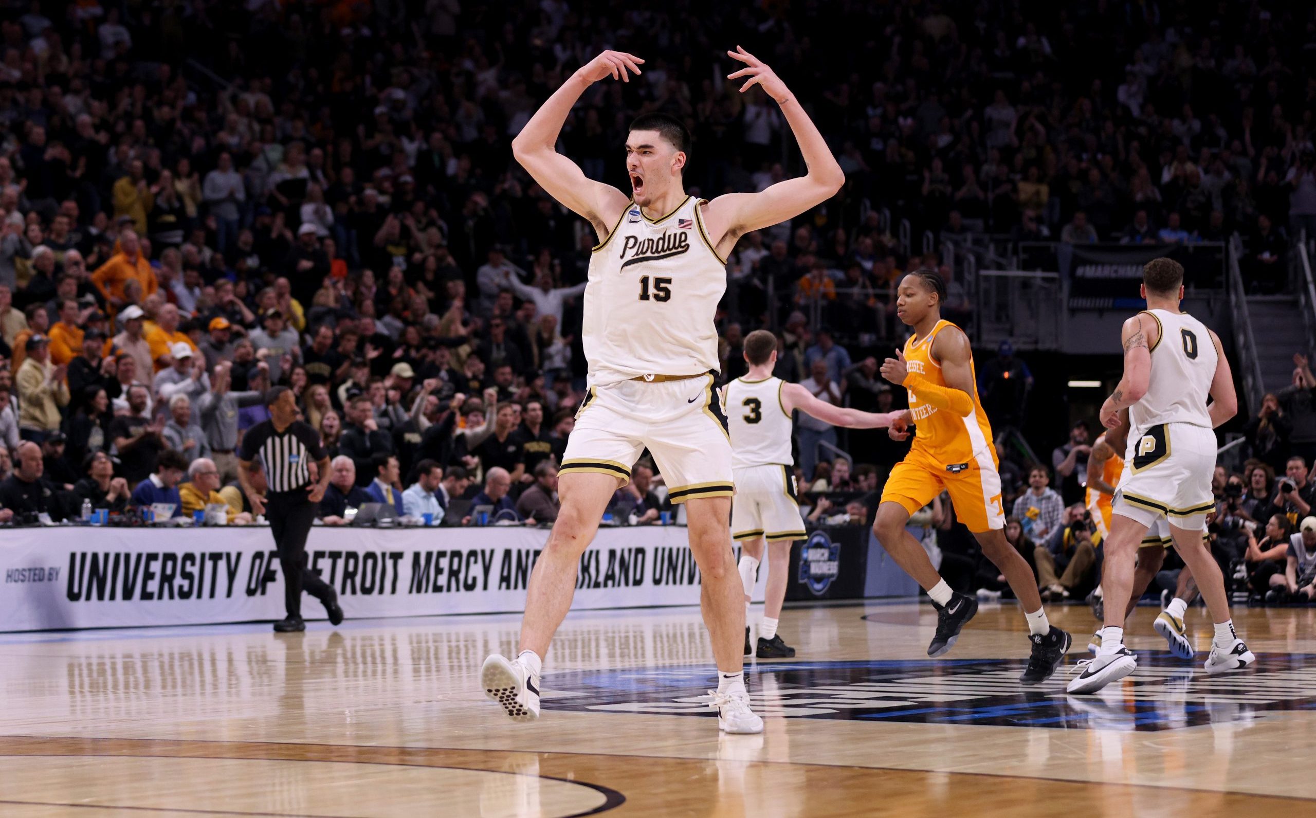 DETROIT, MICHIGAN - MARCH 31: Zach Edey #15 of the Purdue Boilermakers celebrates against the Tennessee Volunteers during the second half in the Elite 8 round of the NCAA Men's Basketball Tournament at Little Caesars Arena on March 31, 2024 in Detroit, Michigan. (Photo by Mike Mulholland/Getty Images)